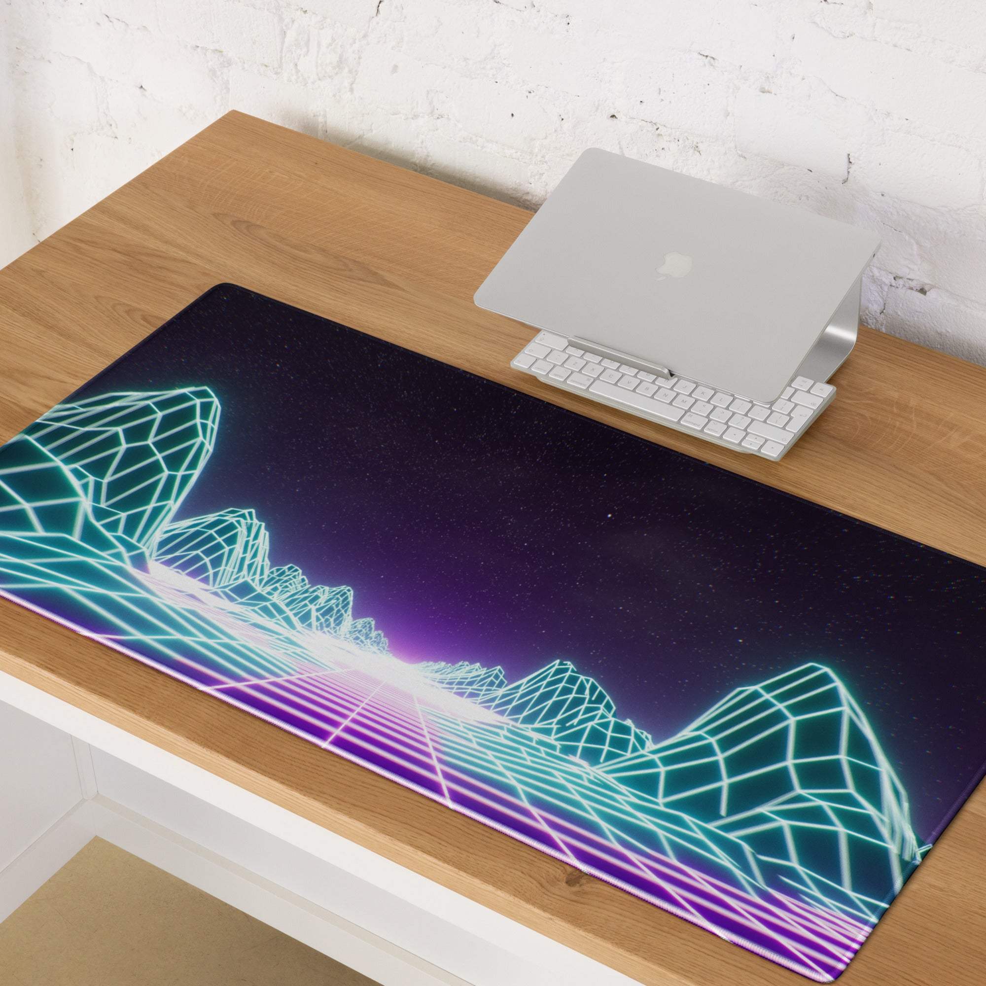 Neon grid mountains gaming mouse pad with glowing teal and pink geometric mountain design on dark purple surface