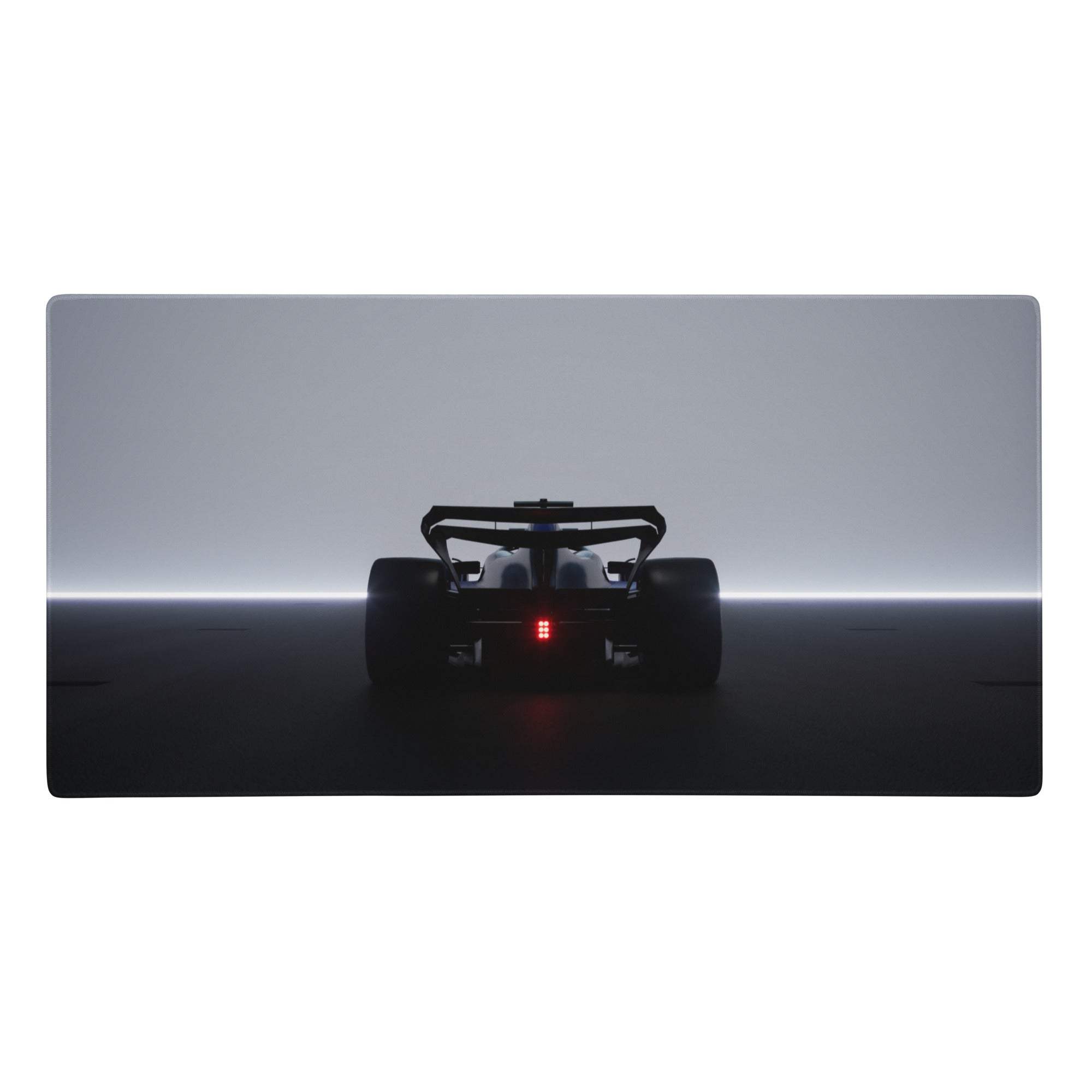A sleek matte black formula 1 race car silhouette with glowing red taillights on a large gray gaming mouse pad