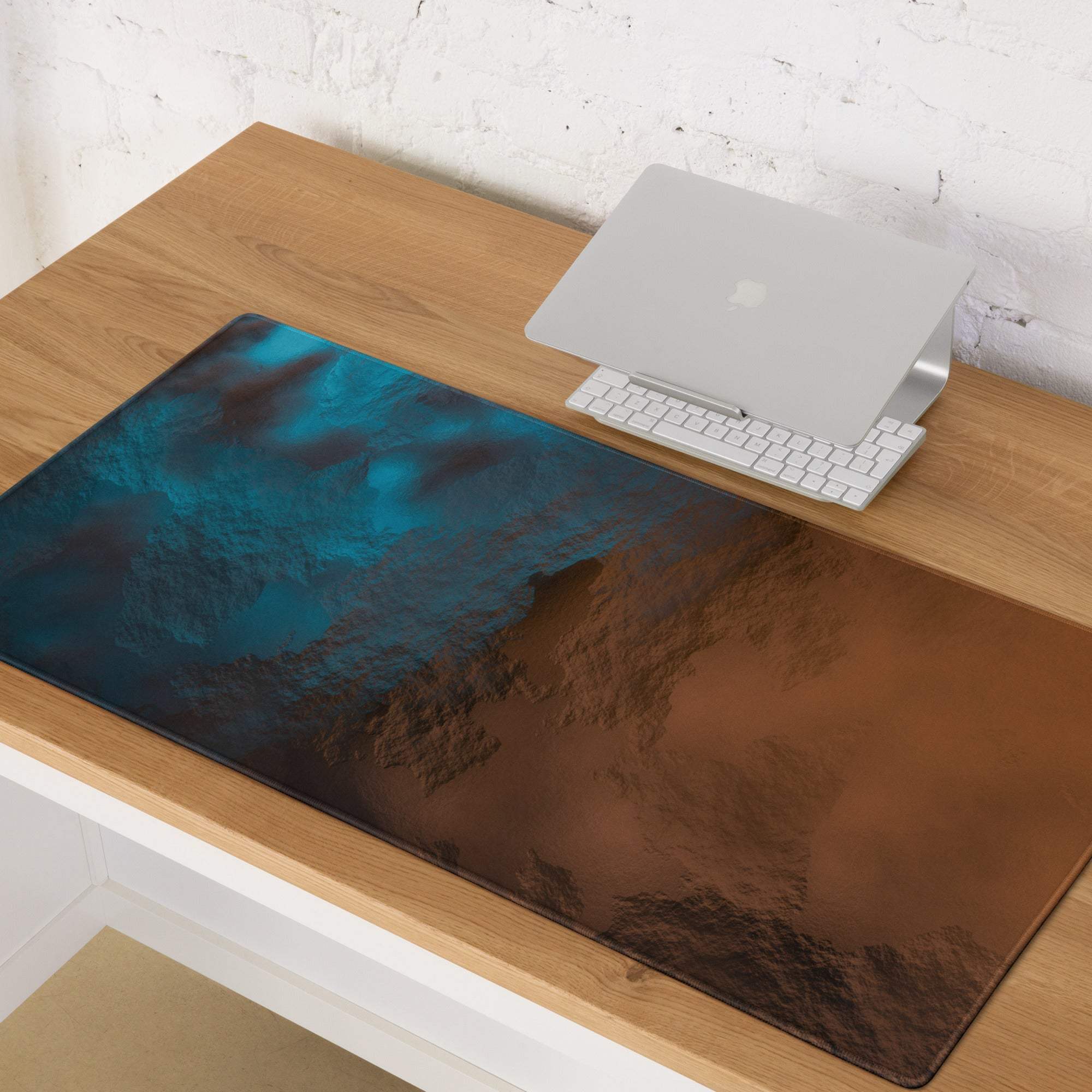Bronze blue leather gaming mouse pad with a vibrant abstract teal and brown design for a modern desk setup