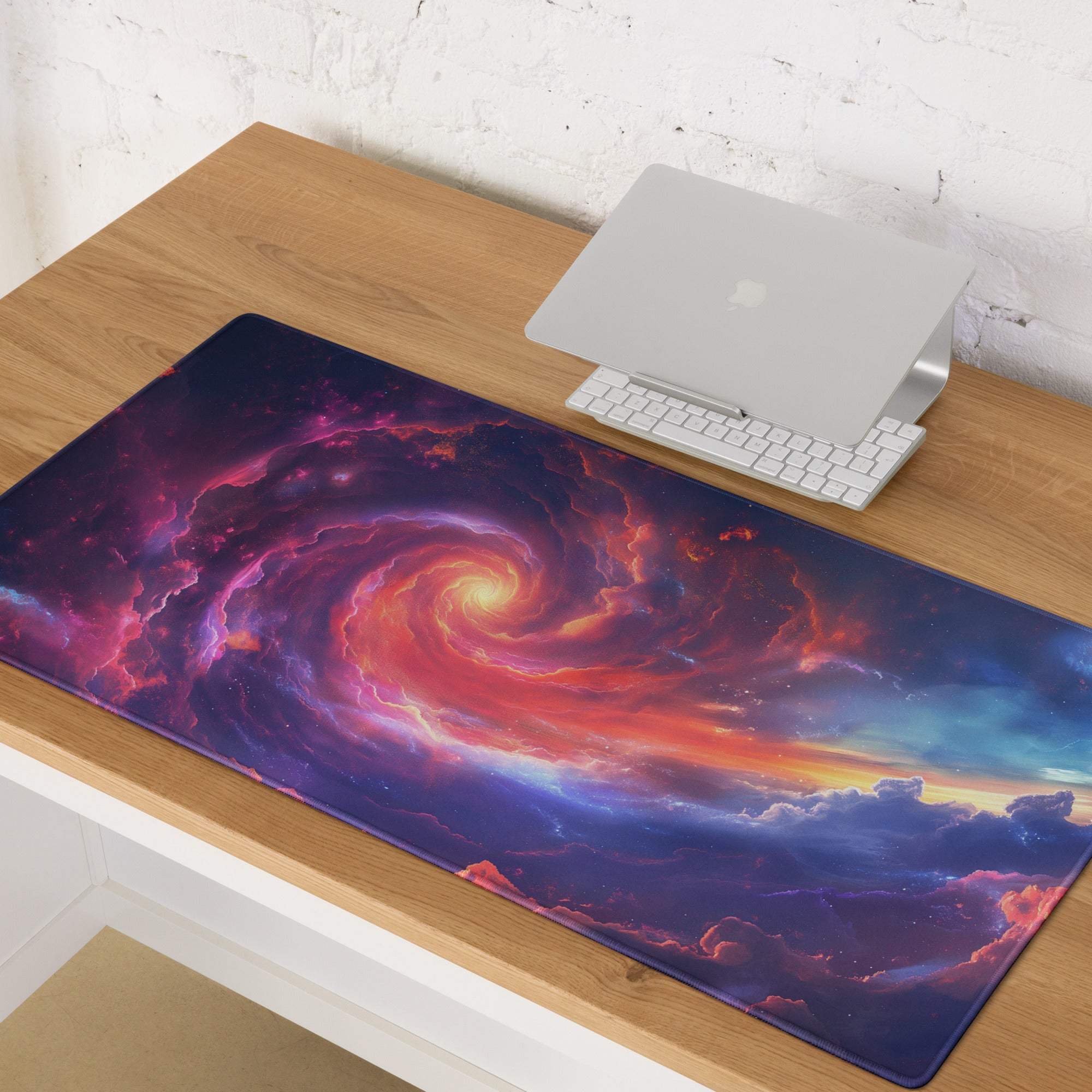 Cosmic nebula gaming mouse pad with vibrant swirling purple pink and orange nebulae on a deep blue background