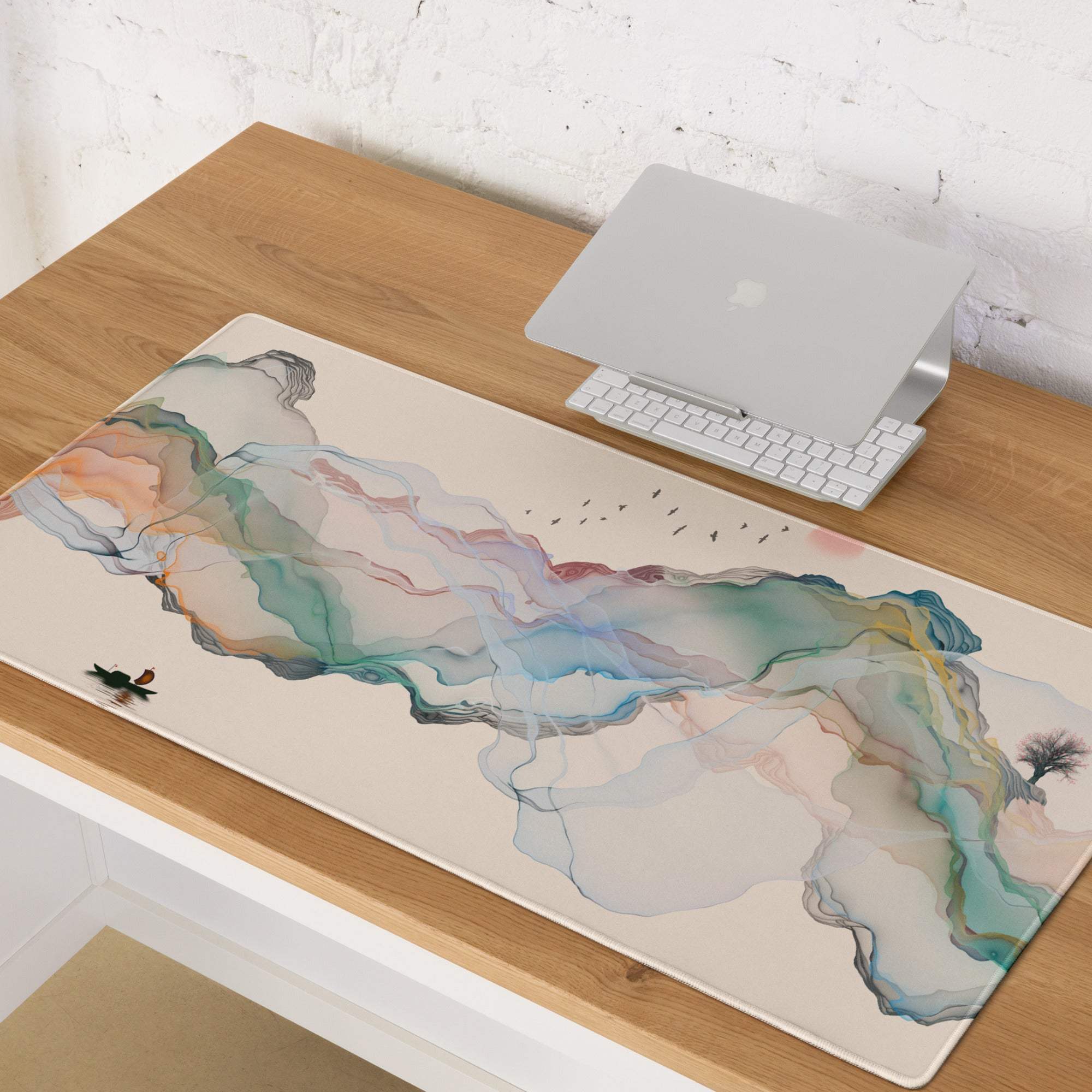 Pastel mountain dream desk pad beige mousepad with teal pink blue watercolor swirls and black bird tree silhouettes