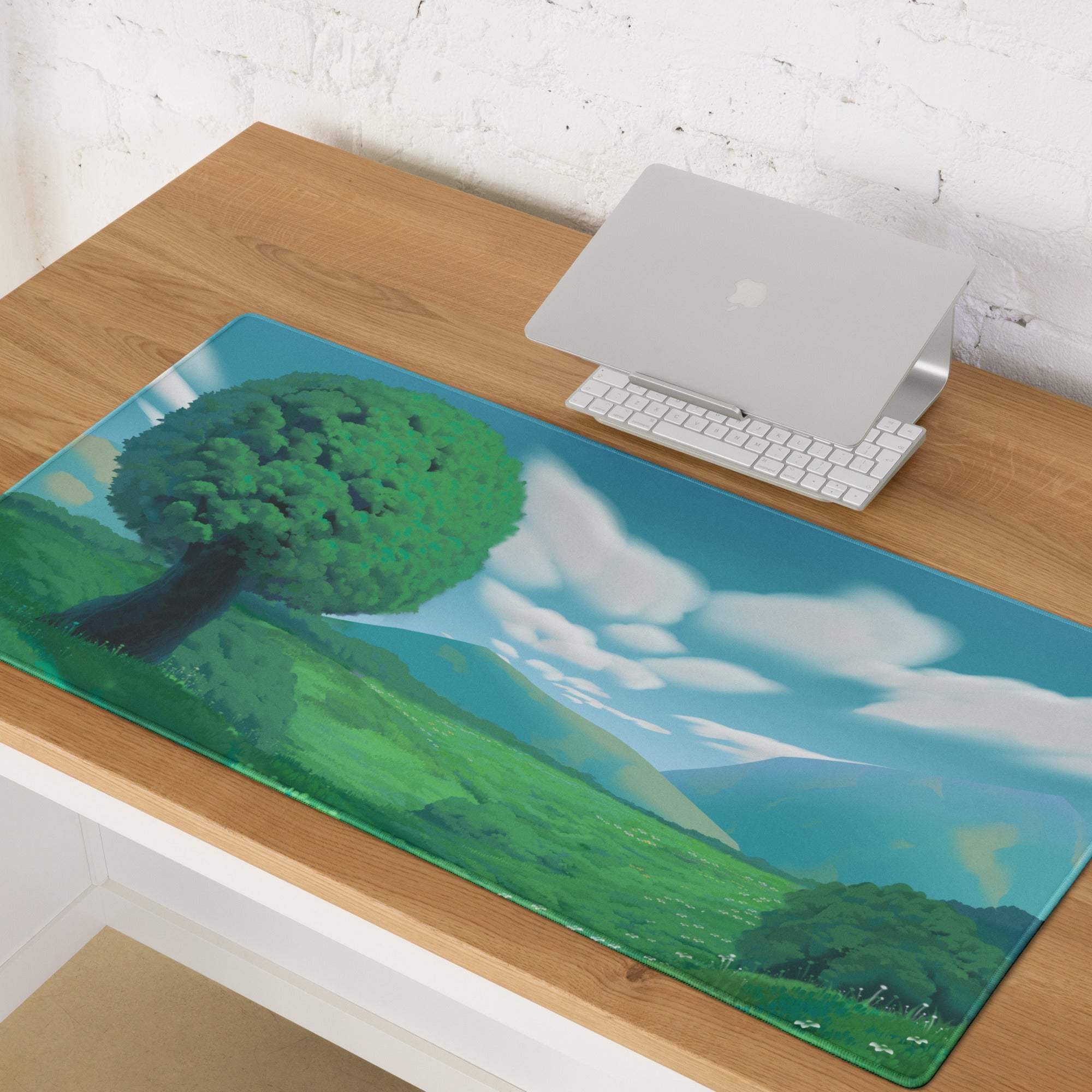 Azure forest landscape mouse pad in glossy blue and green featuring a stylized tree with hills and soft cloud sky design