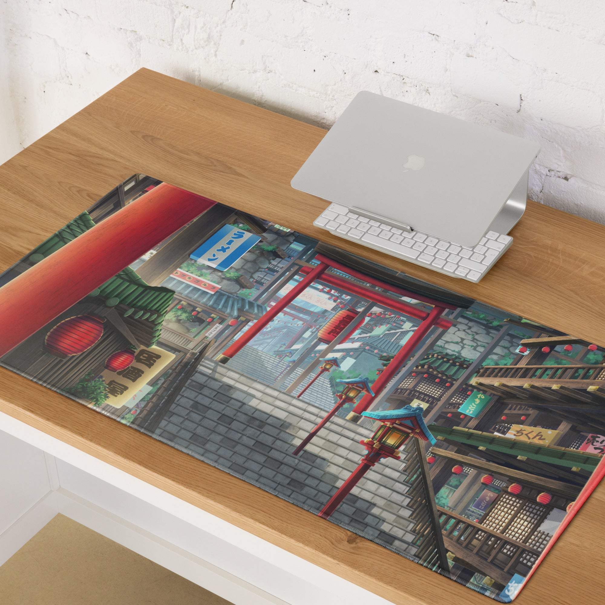 A rectangular glossy desk mat featuring a red and blue anime-style japanese street scene with torii gates and lanterns