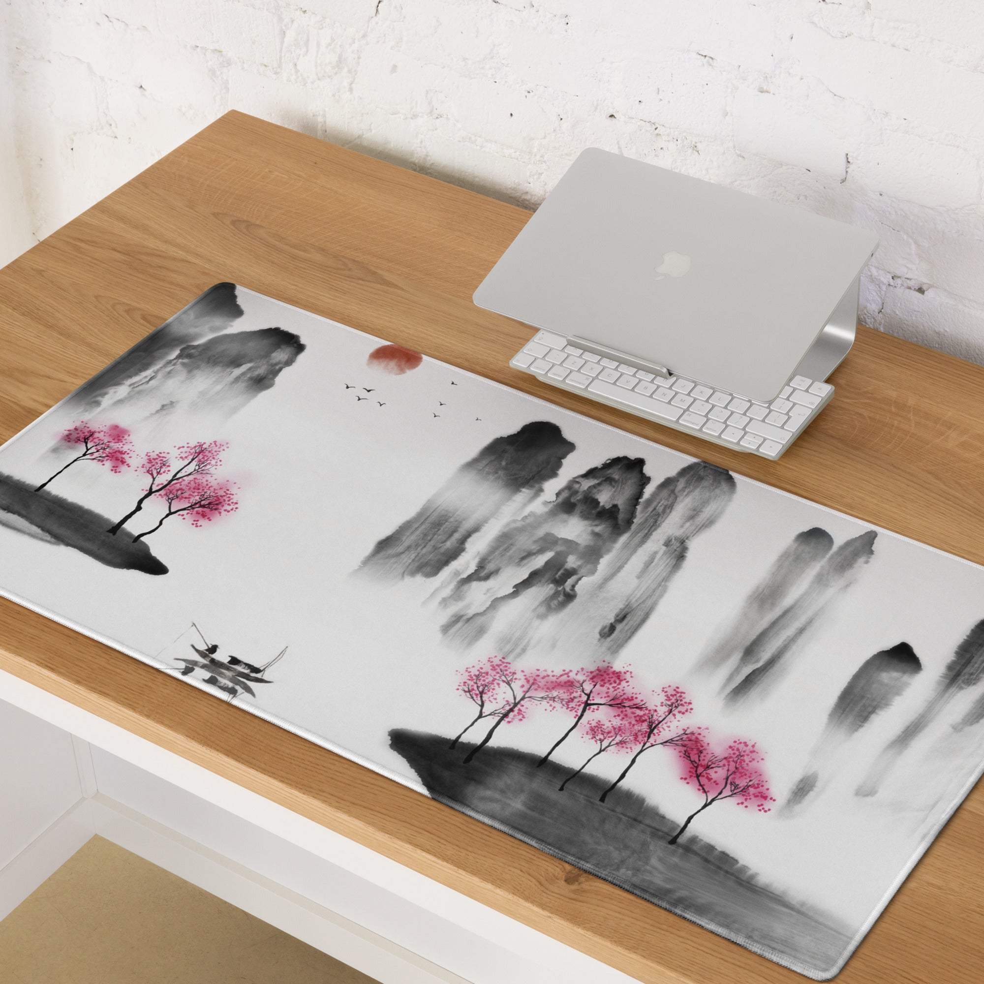 Rectangular zen ink landscape mouse pad with black white sumi-e mountains pink cherry blossoms and red sun on gray background