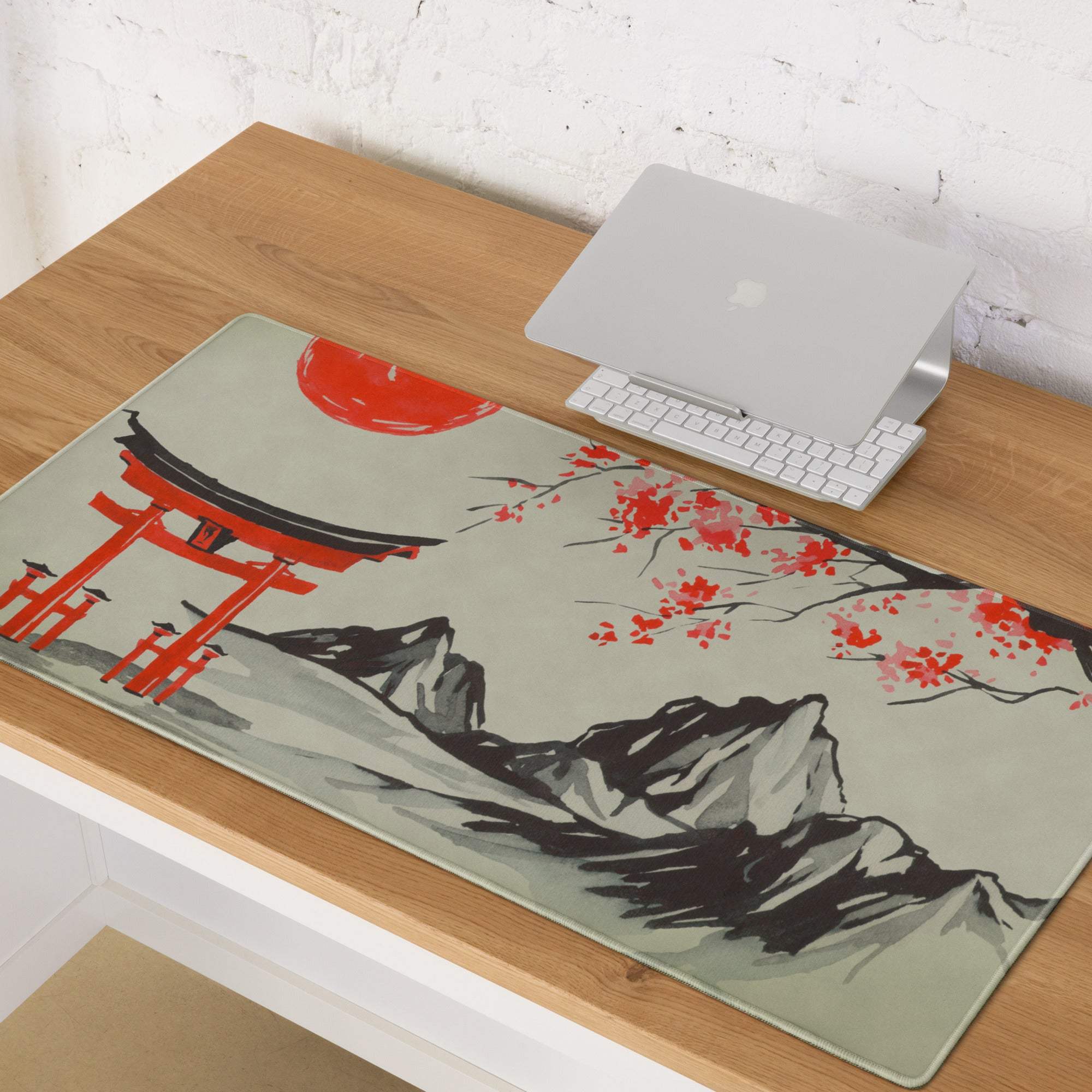 Blossom red pagoda desk mat featuring red torii gates and cherry blossoms on a light gray mousepad with zen art design
