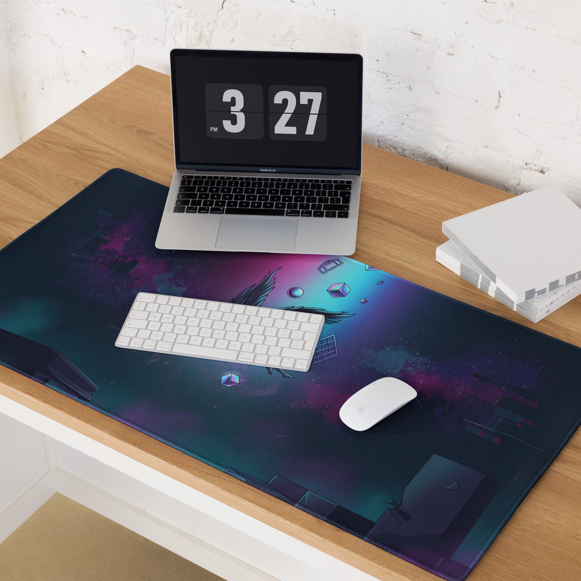 A vibrant cosmic-themed mousepad with deep purple blue teal hues and geometric shapes featuring stylized wings