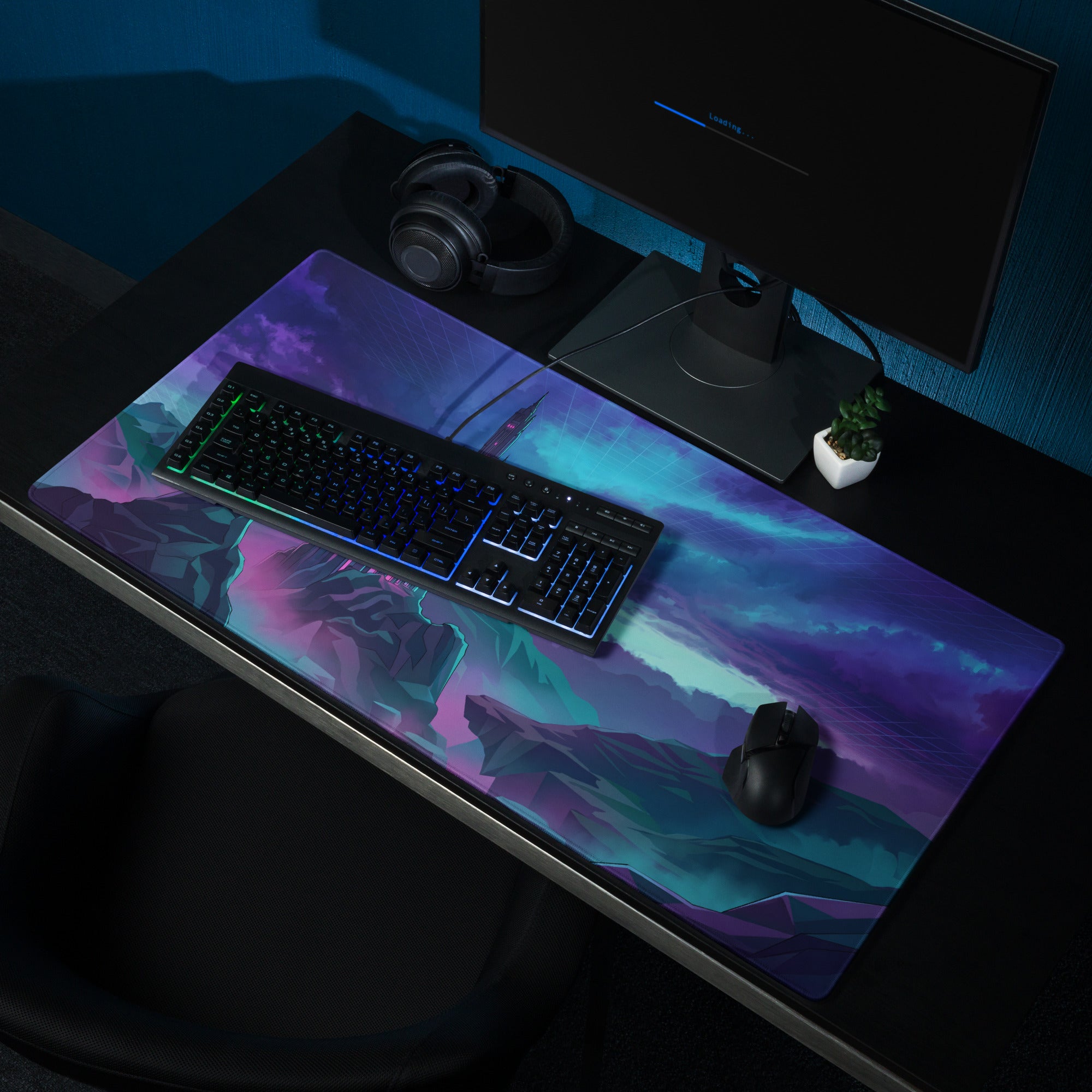 A vibrant rectangular gaming mousepad with a purple and teal stylized cityscape under a starry sky for desktop use