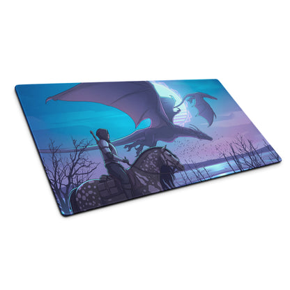Rectangular gaming mousepad with vaporwave neon blue pink dragon rider illustration on a purple and blue twilight sky background