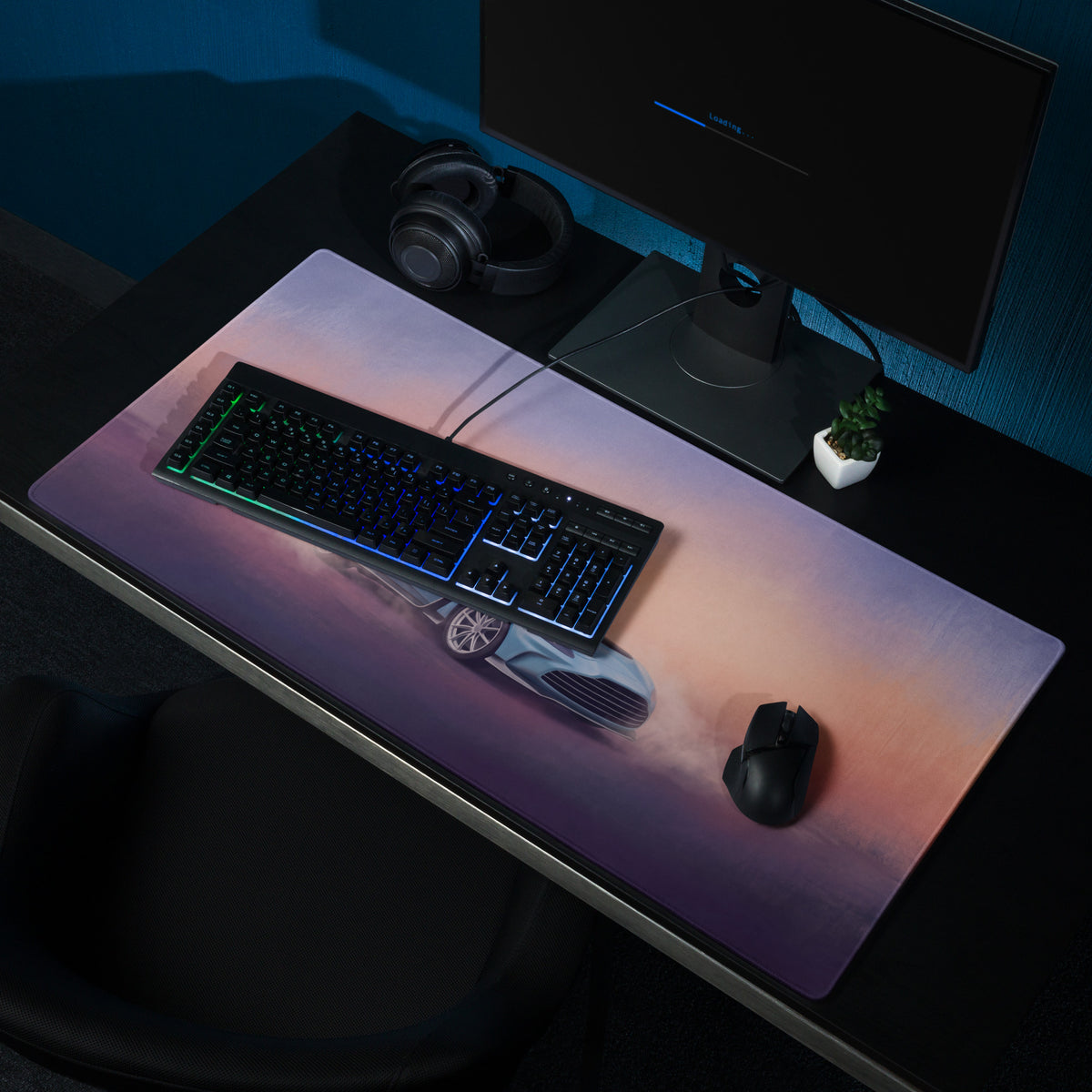 Aston Martin vantage inspired sky blue GT3 desk pad with vibrant purple pink orange gradient and futuristic car design
