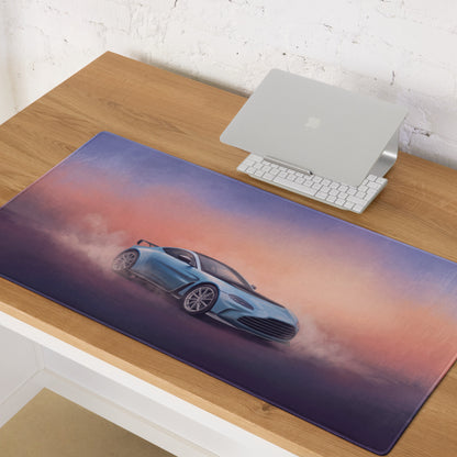 Blue aston martin vantage inspired gt3 sports car graphic on sky blue extended non slip desk pad with sunset gradient