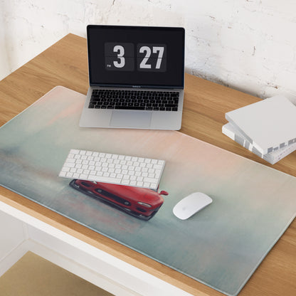 A sleek rectangular xl gaming mousepad with a vibrant red mazda rx-7 inspired car graphic on a soft gradient background