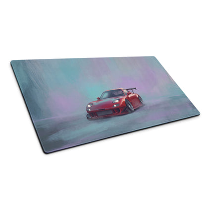 Red sports car graphic on glossy rectangular surface of mazda rx7 inspired vintage red widebody gt wing extended desk pad