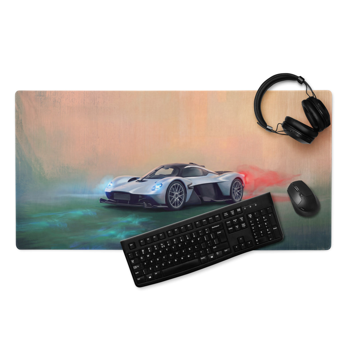 Silver and black sports car graphic printed on a low-friction rectangular desk mat inspired by aston martin valkyrie