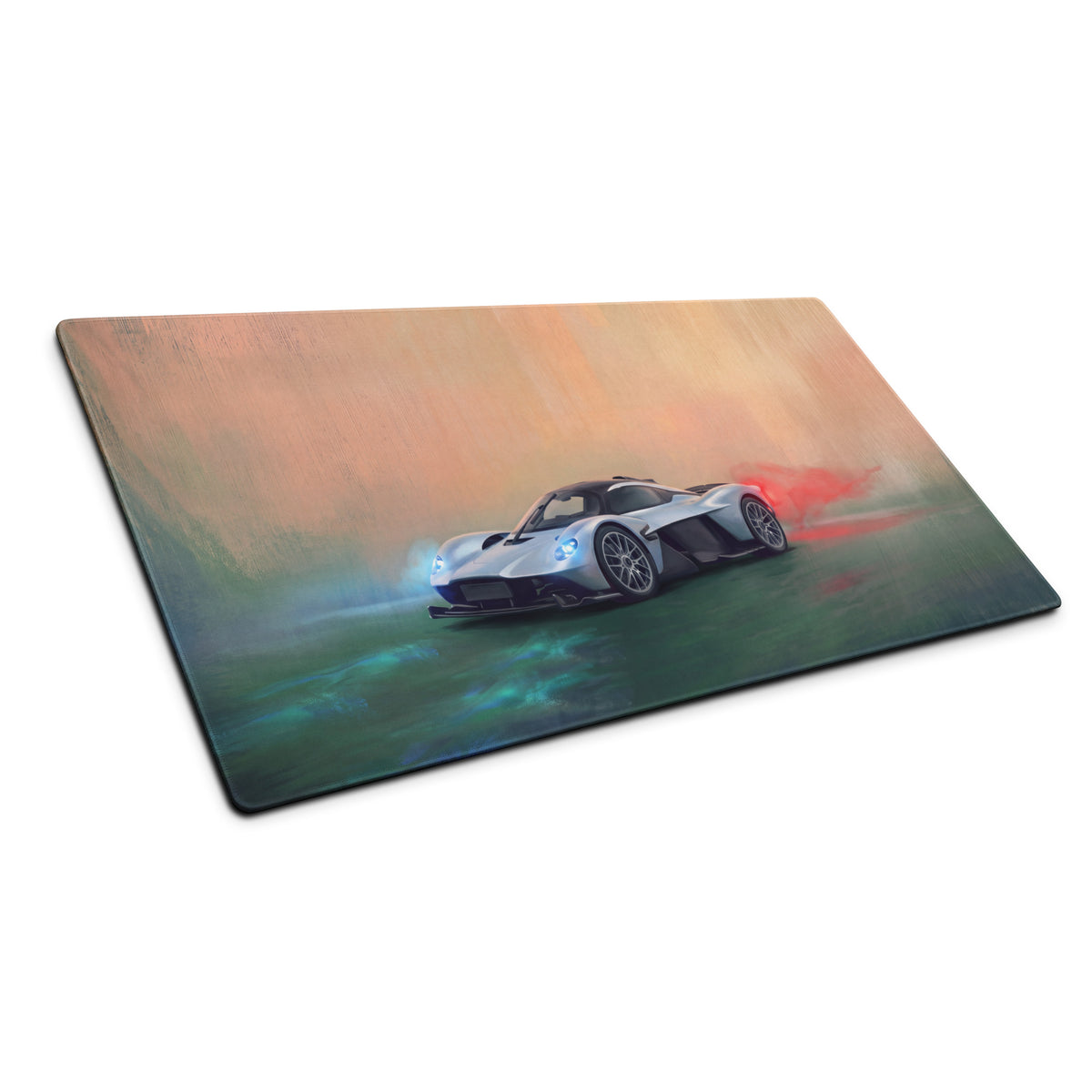 Silver aston martin valkyrie sports car graphic on a low friction rectangular gaming mousepad desk mat