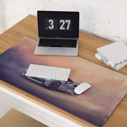 A sleek rectangular premium cloth gaming mousepad featuring a silver Ferrari SF90 XX Stradale graphic speeding across a gradient sky