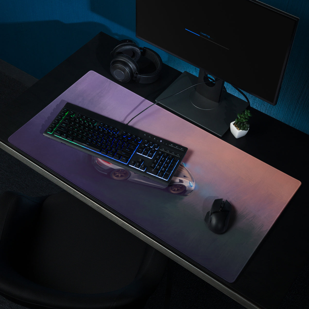 A sleek rectangular Porsche 911 GT3 RS inspired low-friction gaming mousepad with a purple to pink gradient and racing car graphic