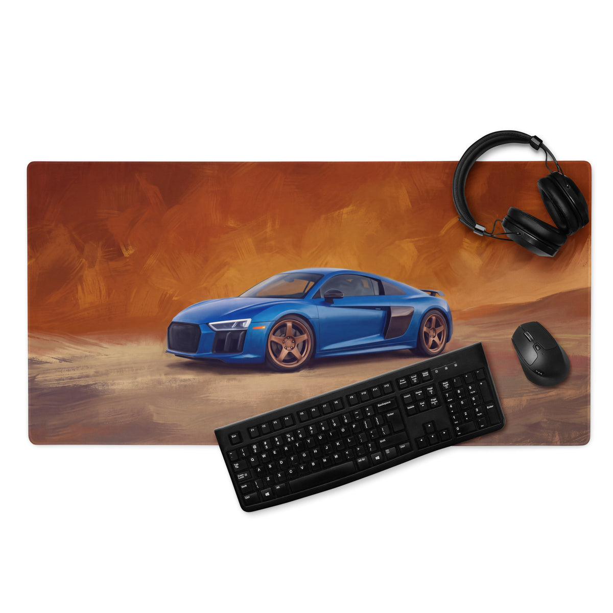 Blue audi r8 sports car graphic on audi r8 inspired sepang blue xl desk pad with non slip rubber base near keyboard