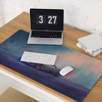 Pagani Huayra R inspired gold leaf desk pad with vibrant gradient sky and dark sports car gaming mousepad