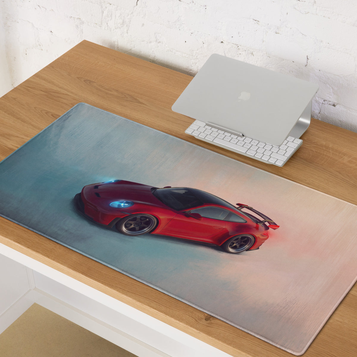Porsche 911 gt3 rs inspired crimson aerial desk mat featuring a red sports car graphic on a low-friction gaming surface