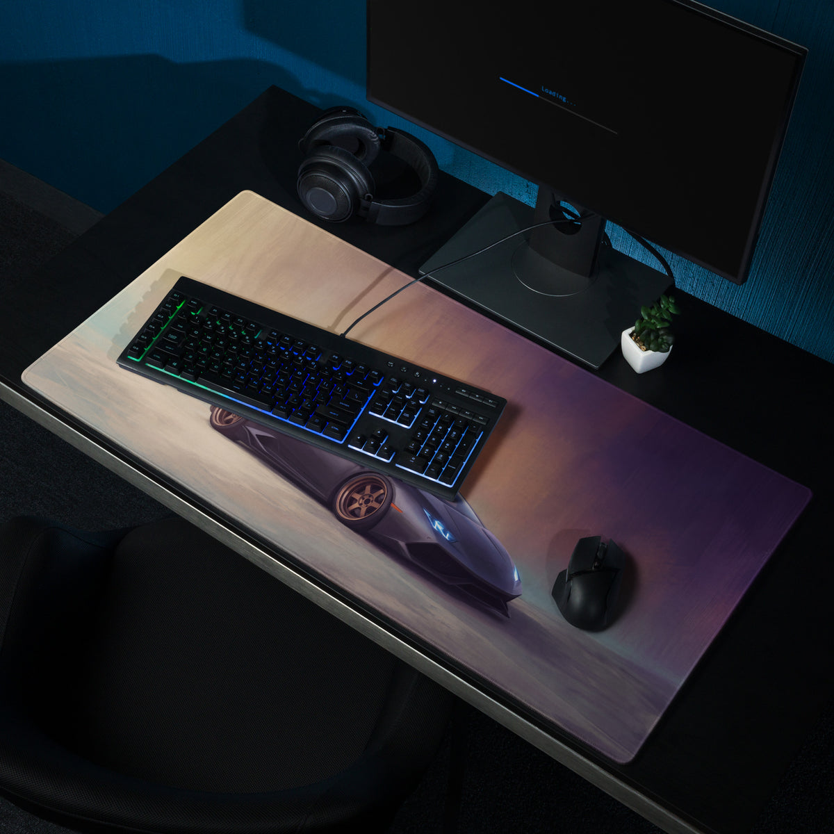 A sleek rectangular gaming mousepad with a dark purple Lamborghini Huracán graphic and ultra-glide cloth surface