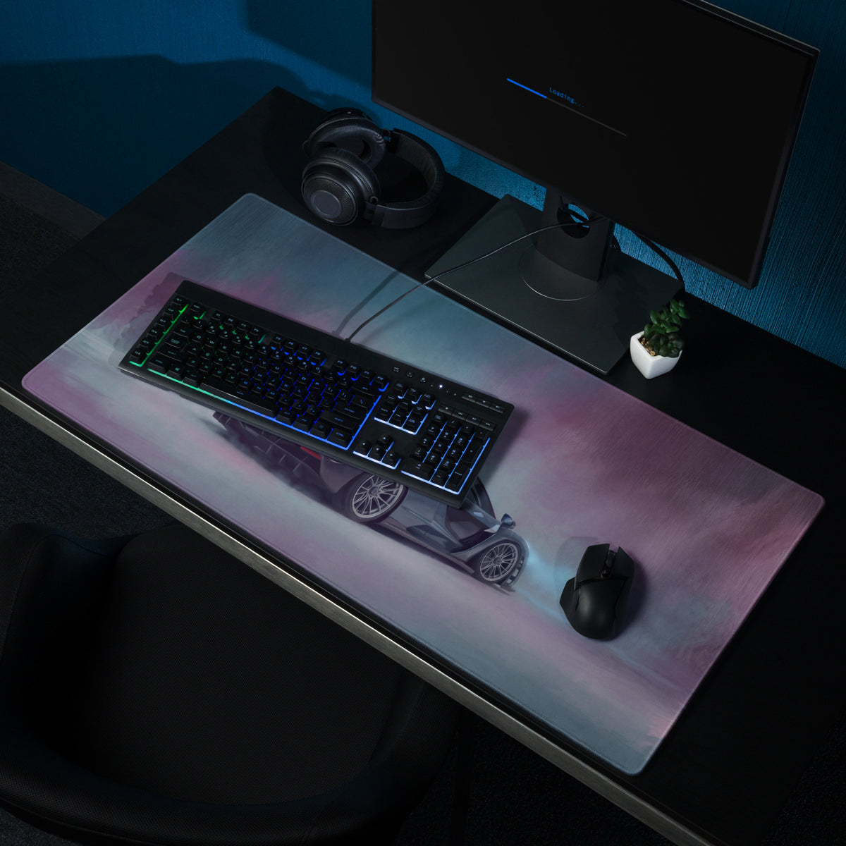 A sleek rectangular ultra-glide xl gaming mouse mat with purple and blue gradient and mclaren senna inspired sports car design