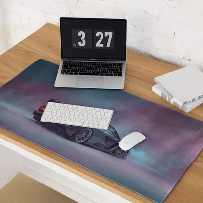 A sleek rectangular McLaren Senna inspired apex stealth desk pad with vibrant purple blue gradient and black sports car graphic