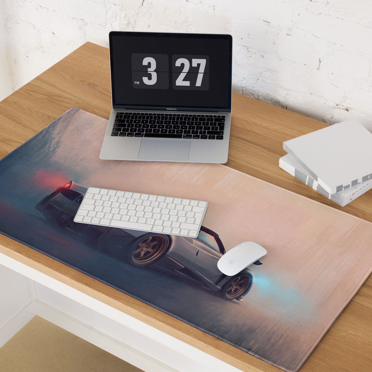 A sleek rectangular non-slip rubber gaming mousepad with a dark gray sports car graphic and glowing red and blue lights