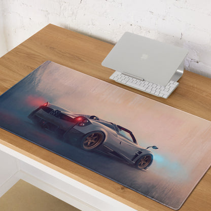 A sleek rectangular non-slip rubber gaming mousepad with a silver pagani huayra drifting and red blue flames
