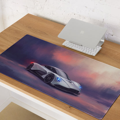 Aston Martin Valhalla inspired silver aero desk mat with glowing blue headlights and purple pink sky design mousepad