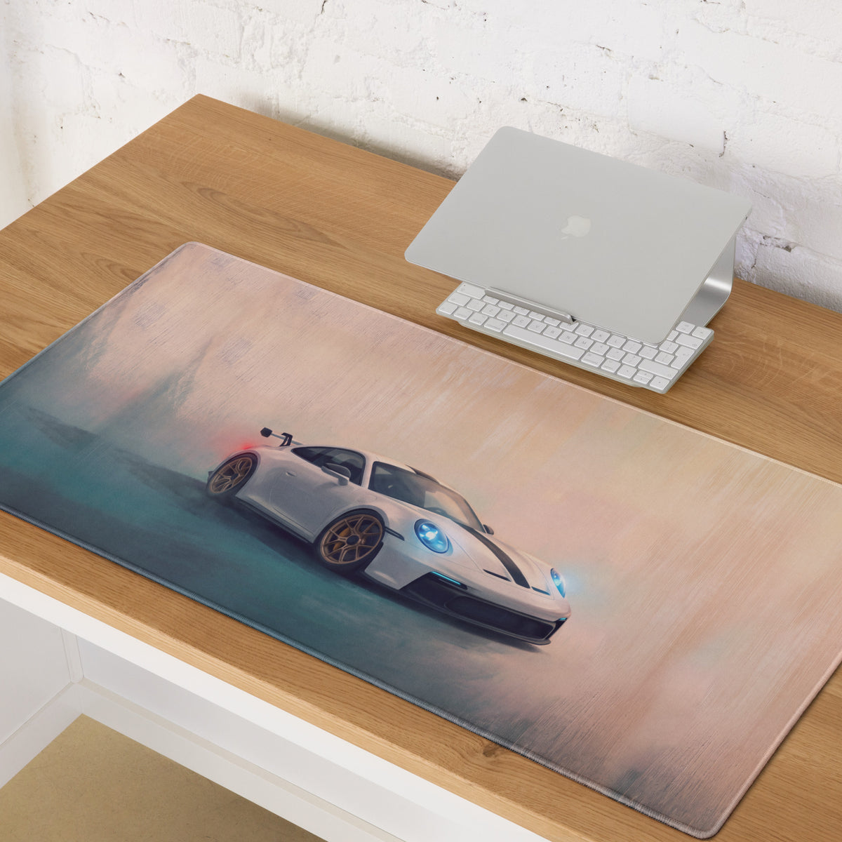 A sleek white porsche 911 gt3 inspired desk pad with glowing blue headlights gold rims on a soft non slip rubber base