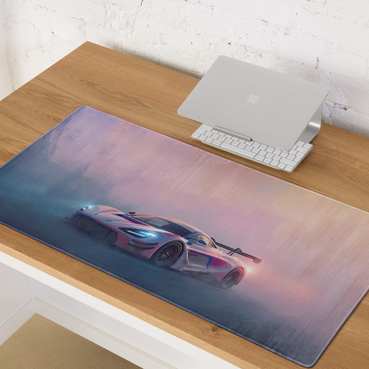 McLaren 720s gt3 inspired neon track desk pad with vibrant pink and blue sports car illustration on stitched xl mat