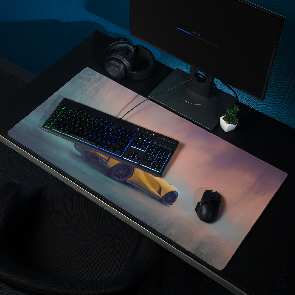 A sleek rectangular gaming mousepad with a vibrant yellow Ferrari 812 Superfast car on a pink and blue gradient background