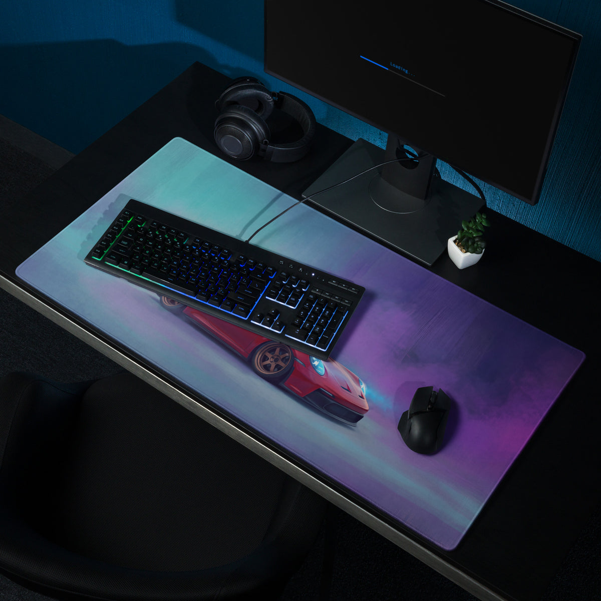 A rectangular extended non-slip gaming mousepad featuring a vibrant red porsche 911 gt3 rs sports car design with blue and purple lighting effects