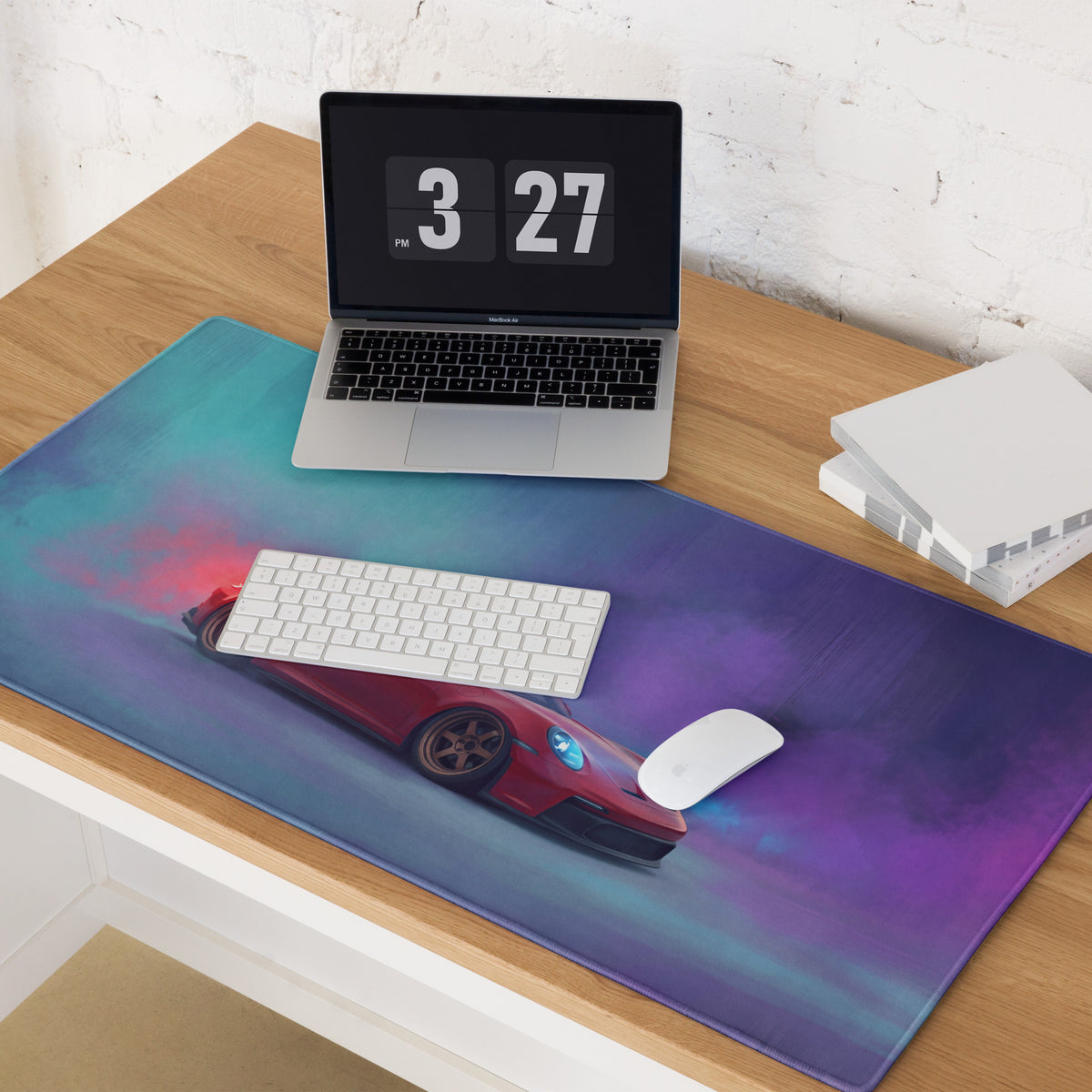 A vibrant extended non-slip gaming mousepad featuring a red porsche 911 gt3 rs drifting on a purple and teal gradient background