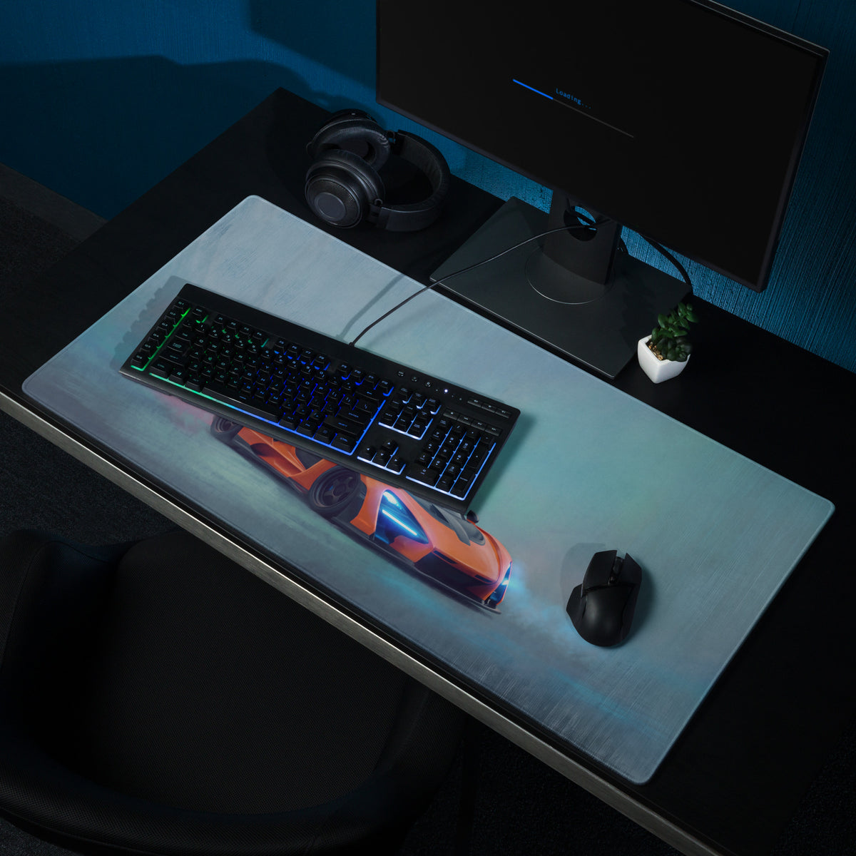 A sleek translucent ultra-glide gaming mousepad with stitched edges featuring a vibrant orange and black McLaren Senna car design