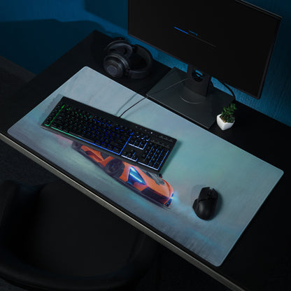 A sleek translucent ultra-glide gaming mousepad with stitched edges featuring a vibrant orange and black McLaren Senna car design