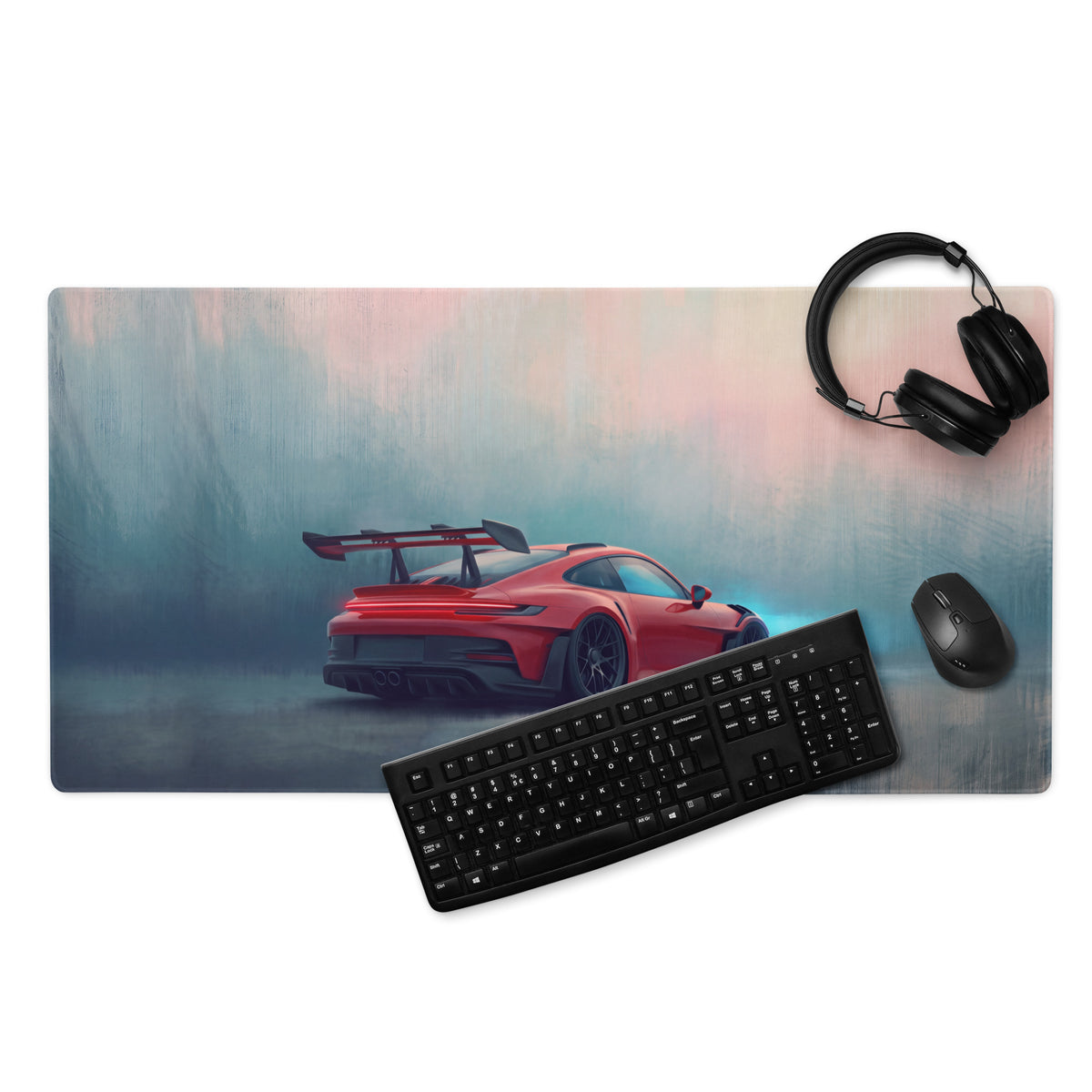 Porsche 911 GT3 RS inspired crimson apex desk mat featuring a red sports car graphic on misty blue and pink background