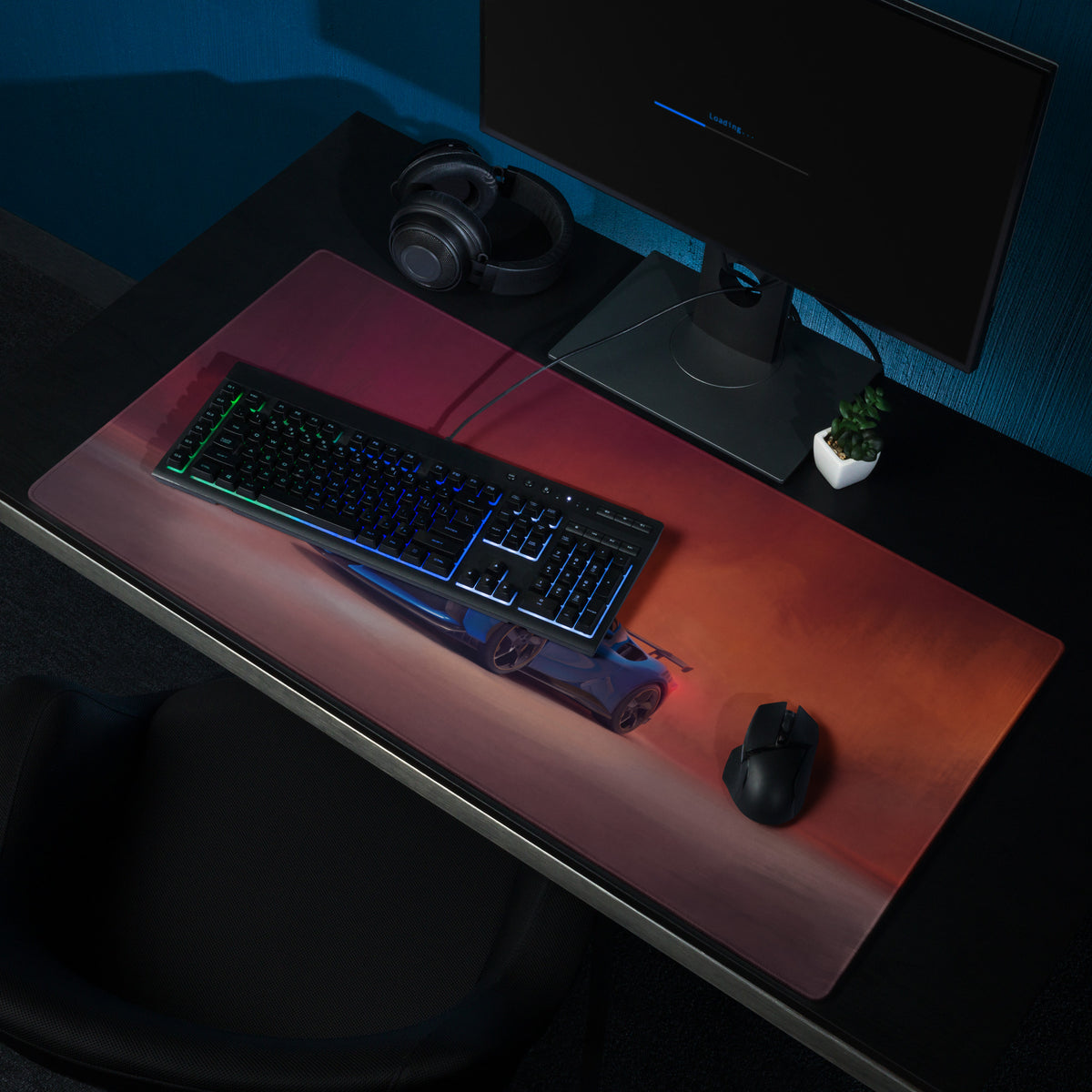 A sleek rectangular ferrari sf90 xx inspired corsa blue desk mat with warm red and orange gradient for high precision gaming