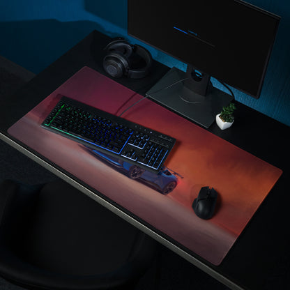 A sleek rectangular ferrari sf90 xx inspired corsa blue desk mat with warm red and orange gradient for high precision gaming