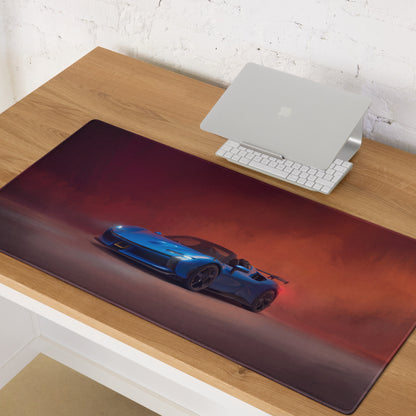 Ferrari sf90 xx inspired corsa blue desk mat featuring a blue sports car graphic on red and orange gradient background