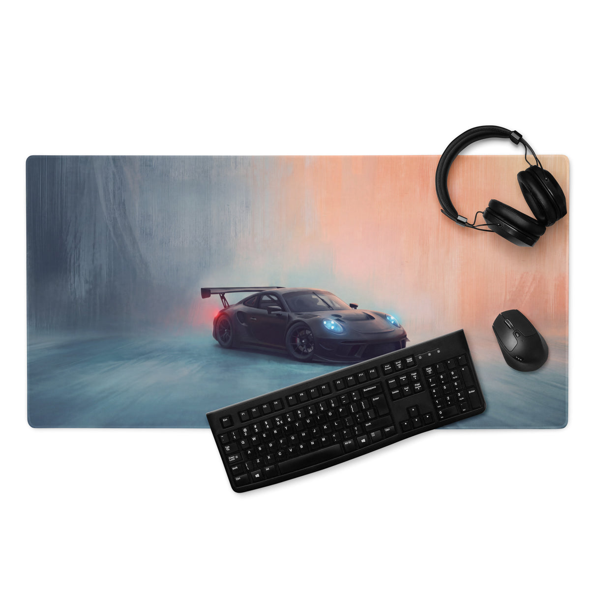 Black porsche 911 gt3 inspired stealth shadow desk mat with low-friction cloth and foggy orange-pink sky background