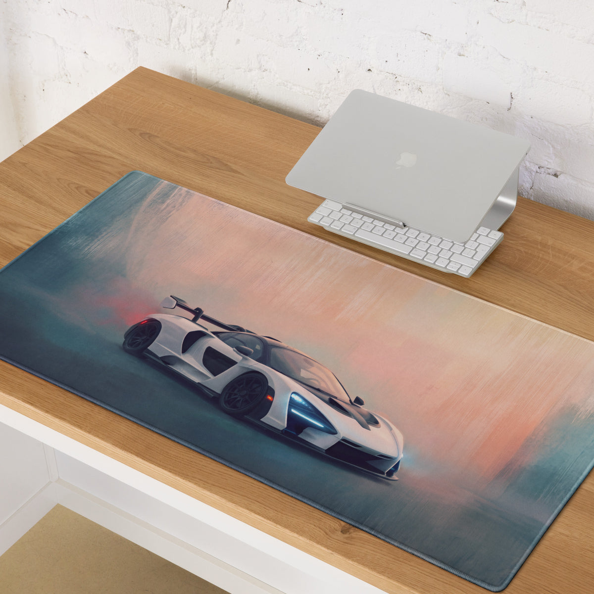 A sleek white mclaren senna inspired sports car printed on a soft ultra-glide stitched edge gaming mousepad