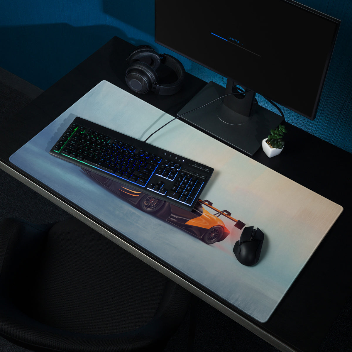 A sleek low-friction cloth McLaren 720S GT3 inspired mousepad with vibrant orange and black race car design