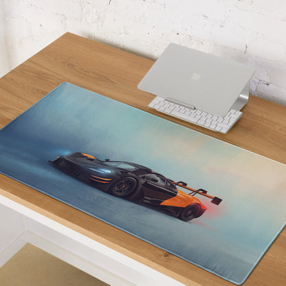 A sleek rectangular low-friction cloth gaming mousepad featuring an orange and black McLaren 720S GT3 graphic