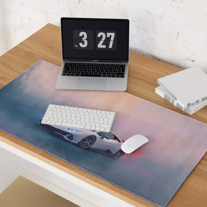 A sleek gray sports car graphic printed on a soft rectangular lamborghini huracán inspired pearl white desk pad with blue and pink gradient