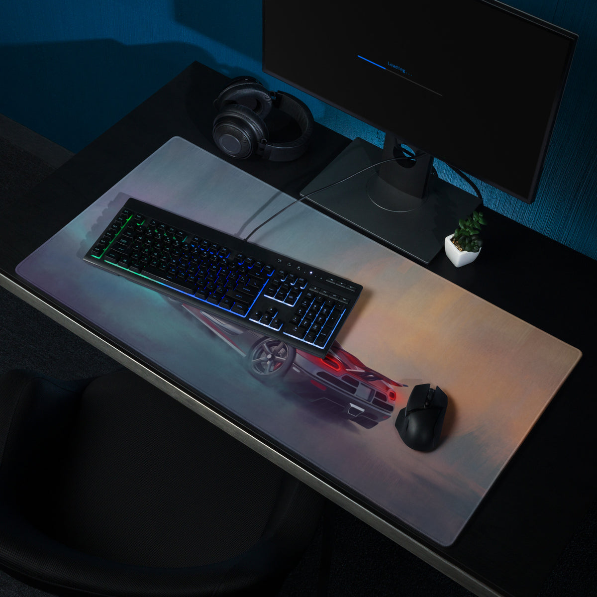 A sleek low-friction cloth gaming mousepad with a vibrant red and black Koenigsegg Agera inspired sports car design