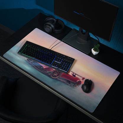 Pagani Zonda inspired rosso sunset extended non slip desk pad featuring a sleek red sports car design and glowing keyboard accents