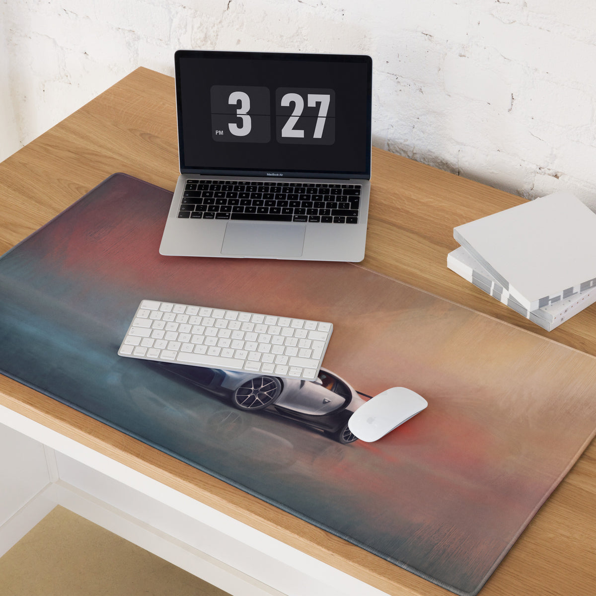 A sleek rectangular bugatti chiron inspired glacier sunset desk mat with a vibrant gradient and silver sports car design