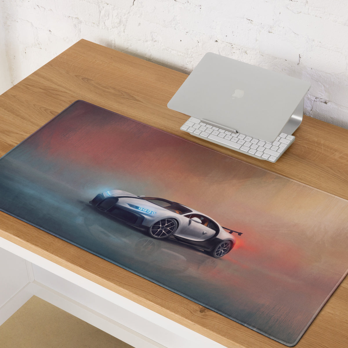 A sleek silver bugatti chiron graphic on a long xl gaming mousepad with a red and blue gradient background