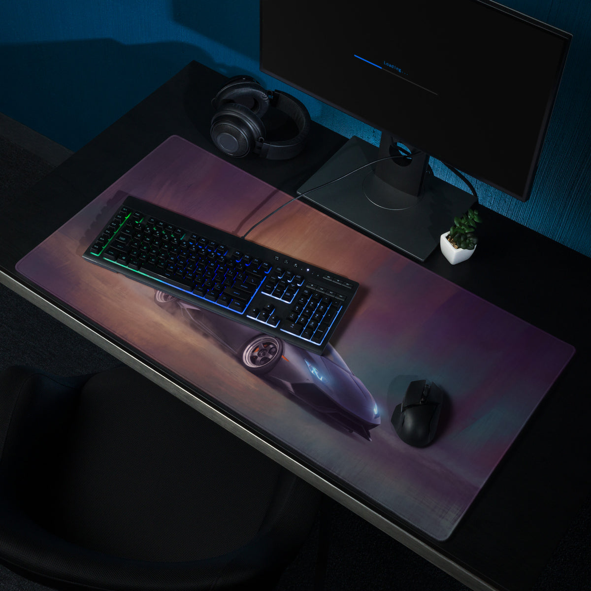 A sleek rectangular gaming mousepad with stitched edges featuring a purple and pink Lamborghini Huracán inspired design
